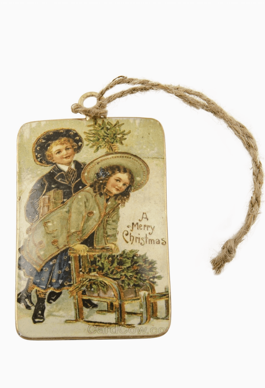 Vintage tinnpynt med vintermotiv