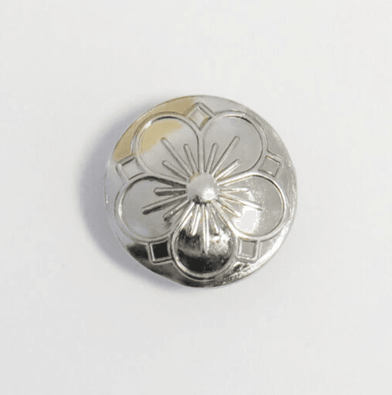 Knapp blomst blank metall med øye 20,5 mm